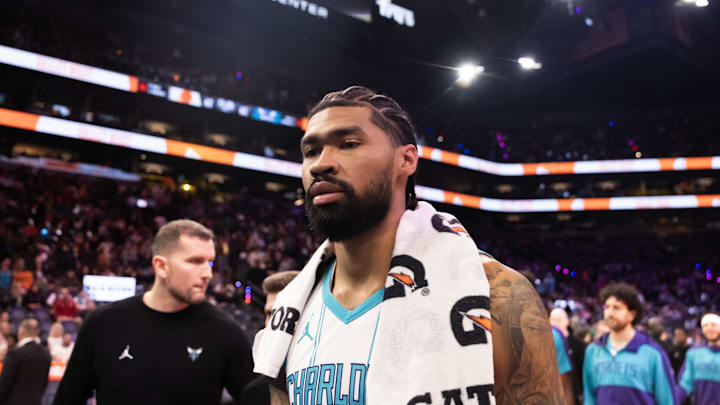 Jan 12, 2025; Phoenix, Arizona, USA; Charlotte Hornets center Nick Richards (4) against the Phoenix Suns at Footprint Center. Mandatory Credit: Mark J. Rebilas-Imagn Images