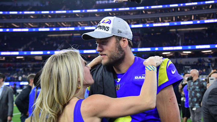 Jan 30, 2022; Inglewood, California, USA; Los Angeles Rams quarterback Matthew Stafford (9) with wife Kelly Hall after defeating the San Francisco 49ers in the NFC Championship Game at SoFi Stadium. Mandatory Credit: Gary A. Vasquez-Imagn Images