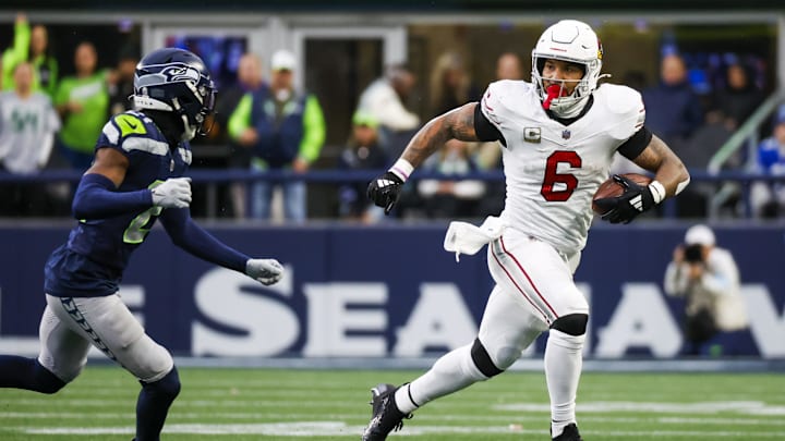 Cardinals running back James Conner (6) runs for yards against the Seahawks in 2024.