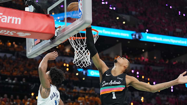 May 4, 2026; San Antonio, Texas, USA; San Antonio Spurs forward Victor Wembanyama (1) blocks a shot by Minnesota Timberwolves guard Terrence Shannon Jr. (1) in the first half during game one of the second round of the 2026 NBA Playoffs at Frost Bank Center. Mandatory Credit: Daniel Dunn-Imagn Images