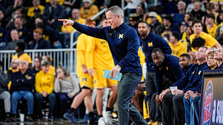 Michigan head coach Dusty May reacts to a play against Villanova during the first half at Crisler Center in Ann Arbor on Tuesday, Dec. 9, 2025. Michigan head coach Dusty May reacts to a play against Villanova during the first half at Crisler Center in Ann Arbor on Tuesday, Dec. 9, 2025.