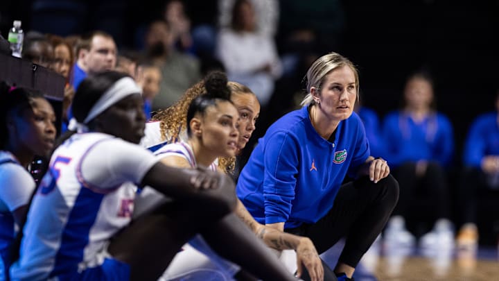 Florida Gators head coach Kelly Rae Finley looks on with Florida Gators guard Kenza Salgues (6) and Florida Gators guard Leilani Correa (23) against the St. John's Red Storm during the first half at Billy Donovan Court at Stephen C. O'Connell Center in Gainesville, FL on Thursday, March 21, 2024. [Matt Pendleton/Gainesville Sun]