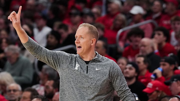 Mar 3, 2026; Cincinnati, Ohio, USA;  BYU Cougars head coach Kevin Young works the sideline against the Cincinnati Bearcats in the first half at Fifth Third Arena. Mandatory Credit: Aaron Doster-Imagn Images