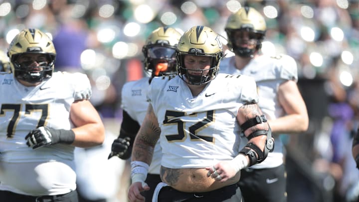 UCF Knights offensive lineman Carter Miller (52) takes the field during the second half of the game against Kansas State Wildcatsat Bill Snyder Family Stadium on Sept. 27, 2025.