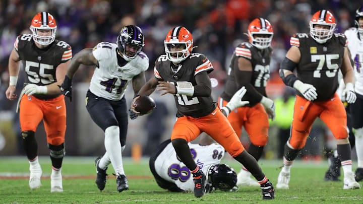 Cleveland Browns quarterback Shedeur Sanders (12) scrambles for yards during the second half of an NFL football game against the Baltimore Ravens at Huntington Bank Field, Nov. 16, 2025, in Cleveland, Ohio.