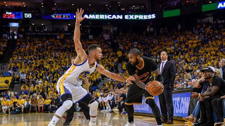 June 4, 2017; Oakland, CA, USA; Cleveland Cavaliers guard Kyrie Irving (2) controls the basketball against Golden State Warriors guard Stephen Curry (30) during the second quarter in game two of the 2017 NBA Finals at Oracle Arena. The Warriors defeated the Cavaliers 132-113. Mandatory Credit: Kyle Terada-USA TODAY Sports