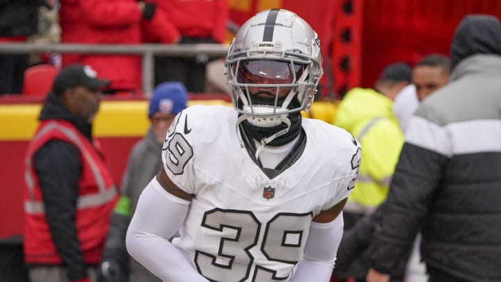 Dec 25, 2023; Kansas City, Missouri, USA; Las Vegas Raiders cornerback Nate Hobbs (39) runs onto the field against the Kansas City Chiefs prior to a game at GEHA Field at Arrowhead Stadium. Mandatory Credit: Denny Medley-USA TODAY Sports Dec 25, 2023; Kansas City, Missouri, USA; Las Vegas Raiders cornerback Nate Hobbs (39) runs onto the field against the Kansas City Chiefs prior to a game at GEHA Field at Arrowhead Stadium. Mandatory Credit: Denny Medley-USA TODAY Sports