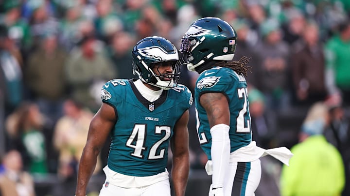 Jan 12, 2025; Philadelphia, Pennsylvania, USA; Philadelphia Eagles linebacker Oren Burks (42) reacts with cornerback Kelee Ringo (22) against the Green Bay Packers in an NFC wild card game at Lincoln Financial Field. Mandatory Credit: Bill Streicher-Imagn Images