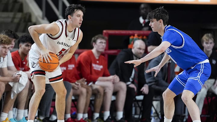 Feb 3, 2026; Davidson, North Carolina, USA; Davidson Wildcats guard Parker Friedrichsen (5) sets the play defended by Saint Louis Billikens forward Brady Dunlap (11) during the second half at McKillop Court at John M. Belk Arena. Mandatory Credit: Jim Dedmon-Imagn Images Feb 3, 2026; Davidson, North Carolina, USA; Davidson Wildcats guard Parker Friedrichsen (5) sets the play defended by Saint Louis Billikens forward Brady Dunlap (11) during the second half at McKillop Court at John M. Belk Arena. Mandatory Credit: Jim Dedmon-Imagn Images