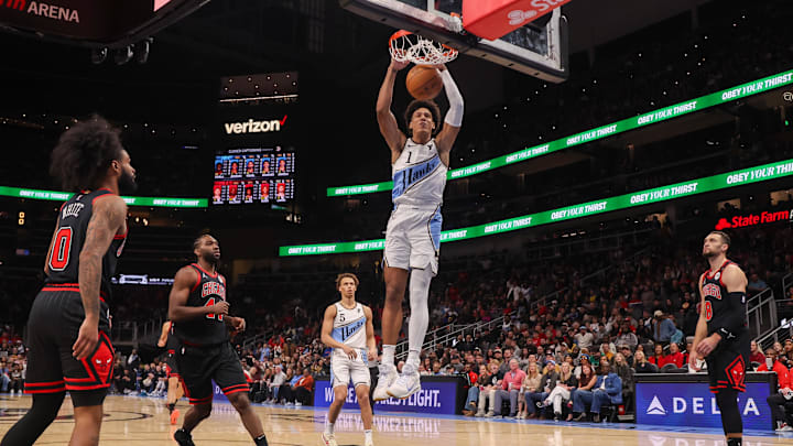 Dec 26, 2024; Atlanta, Georgia, USA; Atlanta Hawks forward Jalen Johnson (1) dunks against the Chicago Bulls in the first quarter at State Farm Arena. Mandatory Credit: Brett Davis-Imagn Images