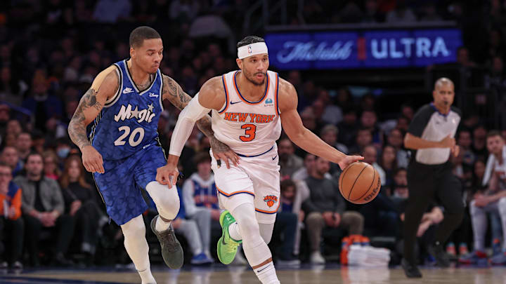 Jan 15, 2024; New York, New York, USA; New York Knicks guard Josh Hart (3) dribbles up court as Orlando Magic guard Markelle Fultz (20) defends during the second half at Madison Square Garden. Mandatory Credit: Vincent Carchietta-Imagn Images