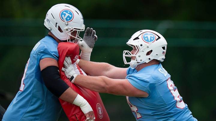 Tennessee Titans center Austin Schlottmann (51) and guard Jackson Slater (64) go through drills during organized team activities at Vanderbilt Health Football Center Friday, May 29, 2026.