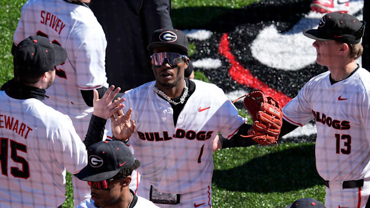 Georgia's Tre Phelps (1) celebrates with his teammates at the end of the third during an NCAA baseball game against UIC in Athens, Ga., on Friday, Feb. 21, 2025.