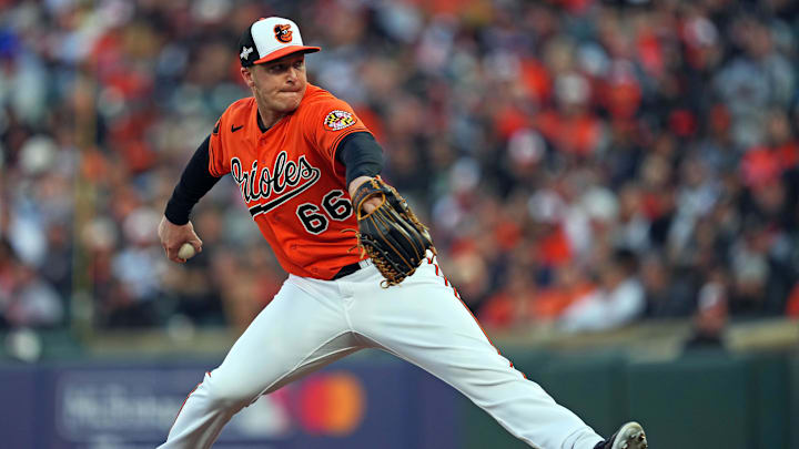 Oct 8, 2023; Baltimore, Maryland, USA; Baltimore Orioles relief pitcher Jacob Webb (66) pitches during the third inning against the Texas Rangers during game two of the ALDS for the 2023 MLB playoffs at Oriole Park at Camden Yards. Mandatory Credit: Mitch Stringer-Imagn Images