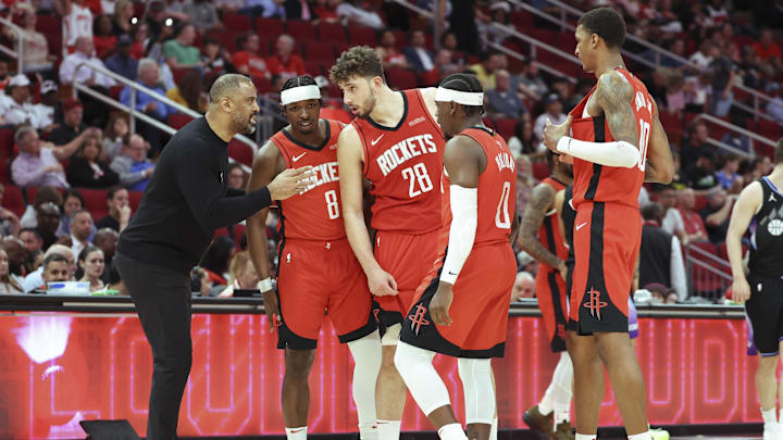 Apr 2, 2025; Houston, Texas, USA; Houston Rockets head coach Ime Udoka talks with players during the fourth quarter against the Utah Jazz at Toyota Center. Mandatory Credit: Troy Taormina-Imagn Images