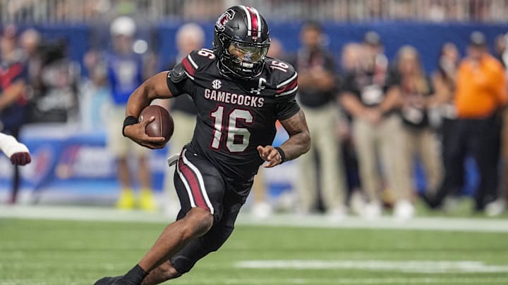 Aug 31, 2025; Atlanta, Georgia, USA; South Carolina Gamecocks quarterback LaNorris Sellers (16) runs against the Virginia Tech Hokies during the first half at Mercedes-Benz Stadium. Mandatory Credit: Dale Zanine-Imagn Images Aug 31, 2025; Atlanta, Georgia, USA; South Carolina Gamecocks quarterback LaNorris Sellers (16) runs against the Virginia Tech Hokies during the first half at Mercedes-Benz Stadium. Mandatory Credit: Dale Zanine-Imagn Images
