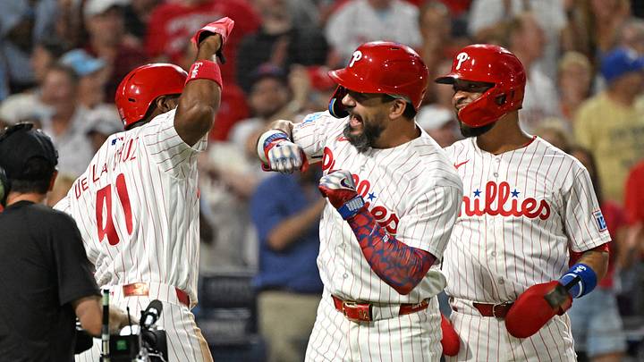 Sep 9, 2026; Philadelphia, Pennsylvania, USA; Philadelphia Phillies designated hitter Kyle Schwarber (12) celebrates with right fielder Bryan de la Cruz (41) after hitting a grand slam home run against the Houston Astros during the sixth inning at Citizens Bank Park. Mandatory Credit: Eric Hartline-Imagn Images