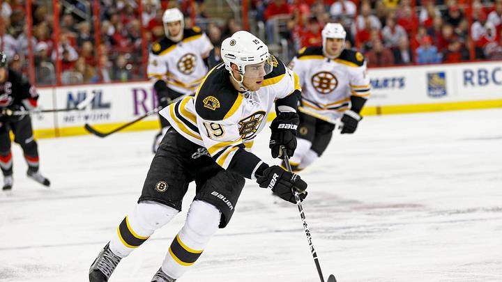October 12, 2011; Raleigh, NC, USA; Boston Bruins center Tyler Seguin (19) carries the puck against the Carolina Hurricanes at the RBC center. The Hurricanes defeated the Bruins 3-2. Mandatory Credit: James Guillory-USA TODAY Sports