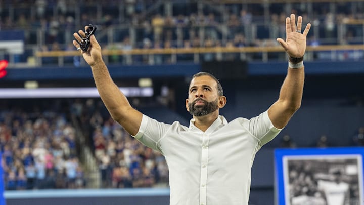 Aug 12, 2023; Toronto, Ontario, CAN; Toronto Blue Jays Jose Bautista waves to the fans before being inducted into the Level of Excellence before an MLB game against the Chicago Cubs at Rogers Centre. Mandatory Credit: Kevin Sousa-Imagn Images