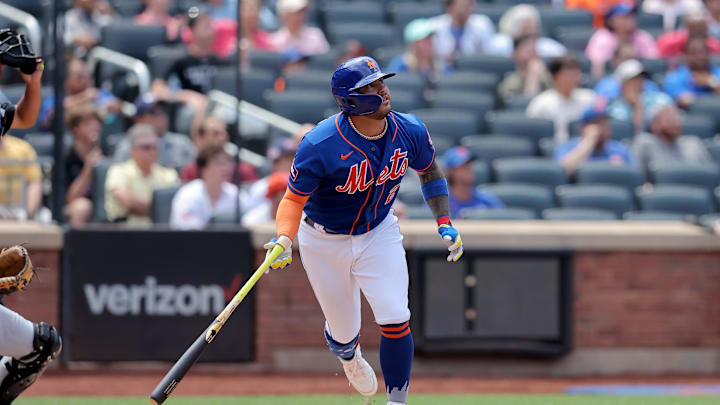 New York Mets catcher Omar Narvaez (2) follows through on a solo home run against the Chicago White Sox during the fifth inning at Citi Field in 2023.