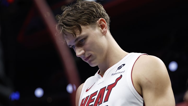 Nov 12, 2024; Detroit, Michigan, USA;  Miami Heat guard Pelle Larsson (9) walks off the court after the game against the Detroit Pistons at Little Caesars Arena. Mandatory Credit: Rick Osentoski-Imagn Images