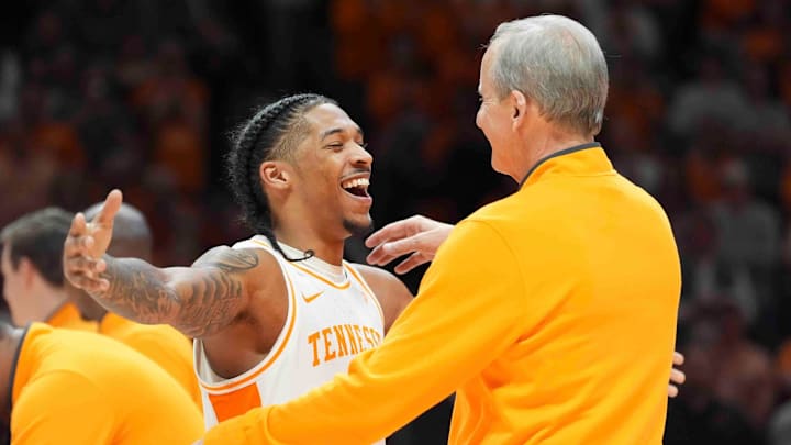 Tennessee's Zakai Zeigler (5) hugs Tennessee head coach Rick Barnes during Senior Day presentations after a men’s college basketball game between Tennessee and South Carolina at Thompson-Boling Arena at Food City Center, Saturday, March 8, 2025.