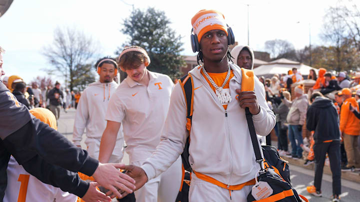 Tennessee wide receiver Radarious Jackson (5) high-fives fans at the Vol Walk before a NCAA football game between Tennessee and Vanderbilt at Neyland Stadium in Knoxville, Tenn., on Nov. 29, 2025.