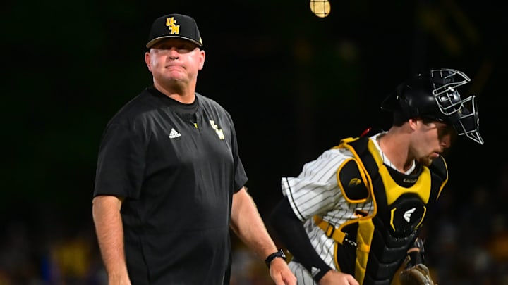 Southern Miss Golden Eagles head coach Christian Ostrander looks at the scoreboard during a 2025 NCAA Hattiesburg Regional game against the Columbia Lions at Pete Taylor Park in Hattiesburg, Mississippi, on May 30, 2025.