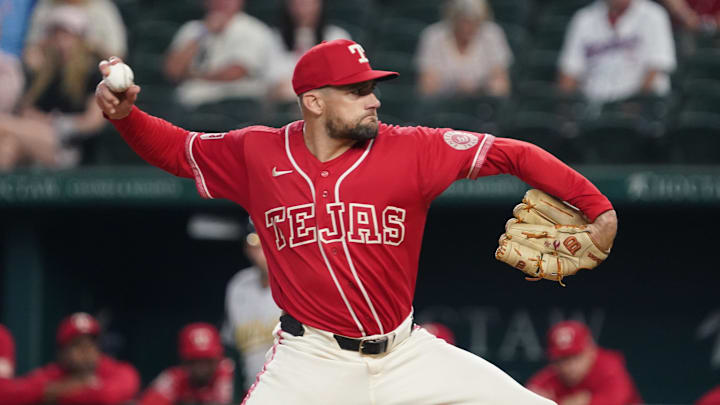 Apr 24, 2026; Arlington, Texas, USA;  Texas Rangers pitcher Nathan Eovaldi (17) throws to the plate during the first inning against the Athletics at Globe Life Field. Mandatory Credit: Raymond Carlin III-Imagn Images