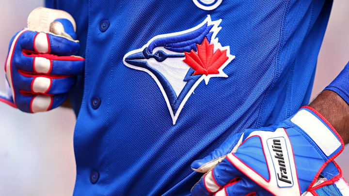 Mar 25, 2018; Dunedin, FL, USA; A view of the Blue Jays logo on an official Majestic game jersey