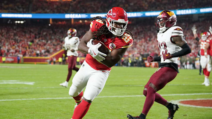 Oct 27, 2025; Kansas City, Missouri, USA; Kansas City Chiefs running back Kareem Hunt (29) carries the ball for a touchdown against the Washington Commanders during the third quarter of the game at GEHA Field at Arrowhead Stadium. Mandatory Credit: Denny Medley-Imagn Images