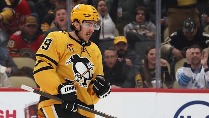 Jan 29, 2026; Pittsburgh, Pennsylvania, USA;  Pittsburgh Penguins center Connor Dewar (19) reacts after scoring a goal against the Chicago Blackhawks during the first period at PPG Paints Arena. Mandatory Credit: Charles LeClaire-Imagn Images