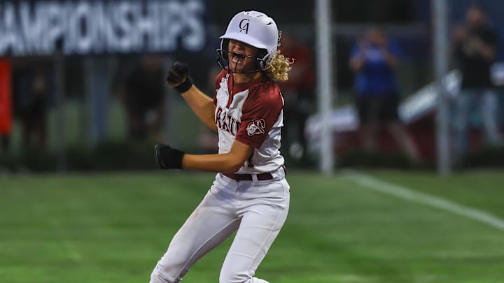 Caravel Academy pitcher Kasey Xenidis (17) reacts after singling and driving to run, during a DIAA STATE TOURNAMENT CHAMPIONSHIP GAME between #2 Sussex Central and #1 Caravel Academy Friday, May. 31, 2024; at UD Softball Stadium on the campus at The University Of Delaware in Newark, DE.
