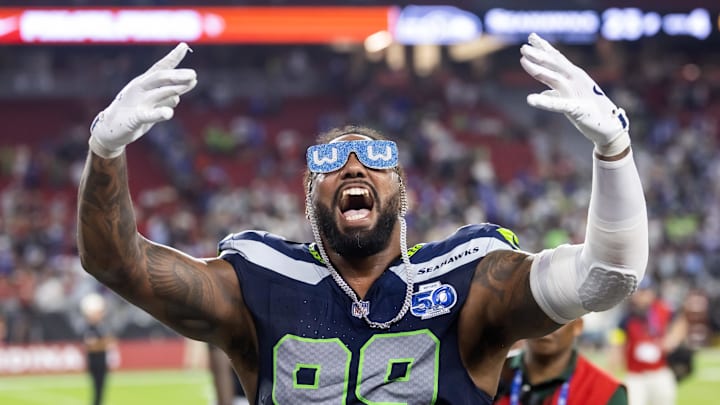 Sep 25, 2025; Glendale, Arizona, USA; Seattle Seahawks defensive end Leonard Williams (99) celebrates after defeating the Arizona Cardinals at State Farm Stadium. Mandatory Credit: Mark J. Rebilas-Imagn Images