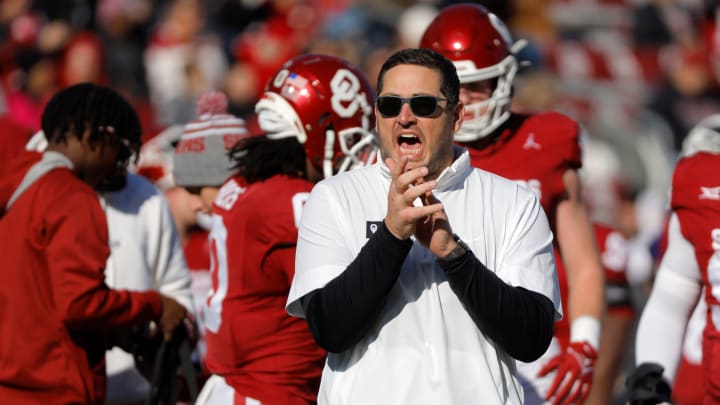Oklahoma offensive coordinator Jeff Lebby claps and shouts as the Oklahoma Sooners warm up before a college football game between the University of Oklahoma Sooners (OU) and the TCU Horned Frogs at Gaylord Family-Oklahoma Memorial Stadium in Norman, Okla., Friday, Nov. 24, 2023. Oklahoma won 69-45. Oklahoma offensive coordinator Jeff Lebby claps and shouts as the Oklahoma Sooners warm up before a college football game between the University of Oklahoma Sooners (OU) and the TCU Horned Frogs at Gaylord Family-Oklahoma Memorial Stadium in Norman, Okla., Friday, Nov. 24, 2023. Oklahoma won 69-45.