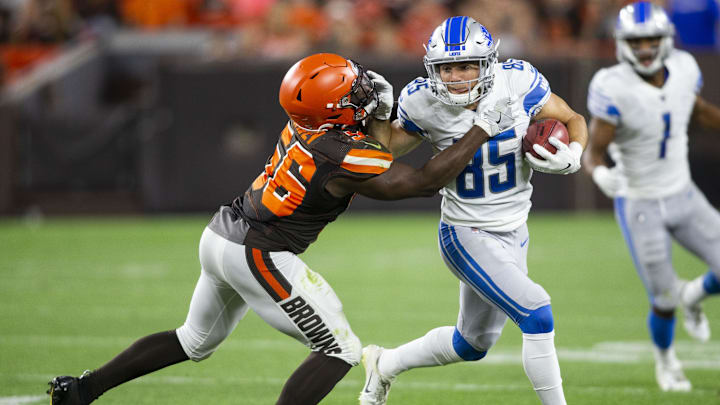 Aug 29, 2019; Cleveland, OH, USA; Detroit Lions wide receiver Tom Kennedy (85) runs the ball against Cleveland Browns linebacker Willie Harvey (56) during the third quarter at FirstEnergy Stadium. The Browns won 20-16. Mandatory Credit: Scott R. Galvin-USA TODAY Sports
