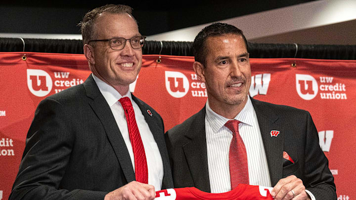 Wisconsin   s new head football coach Luke Fickell, right, is shown with athletic director Chris McIntosh at a news conference November 28, 2022 at Camp Randall Stadium in Madison. He was previously head coach for six seasons at Cincinnati.