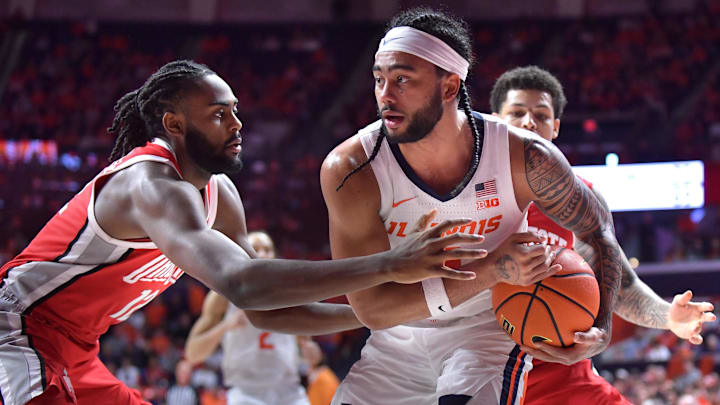 Feb 2, 2025; Champaign, Illinois, USA; Ohio State Buckeyes guard Evan Mahaffey (12) reaches for the ball as Illinois Fighting Illini guard Kylan Boswell (4) has possession during the second half at State Farm Center. Mandatory Credit: Ron Johnson-Imagn Images Feb 2, 2025; Champaign, Illinois, USA; Ohio State Buckeyes guard Evan Mahaffey (12) reaches for the ball as Illinois Fighting Illini guard Kylan Boswell (4) has possession during the second half at State Farm Center. Mandatory Credit: Ron Johnson-Imagn Images