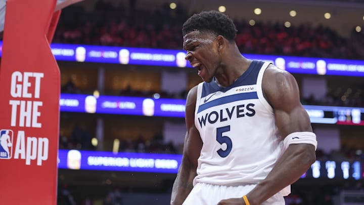Feb 21, 2025; Houston, Texas, USA; Minnesota Timberwolves guard Anthony Edwards (5) reacts after scoring a basket during the second quarter against the Houston Rockets at Toyota Center. Mandatory Credit: Troy Taormina-Imagn Images