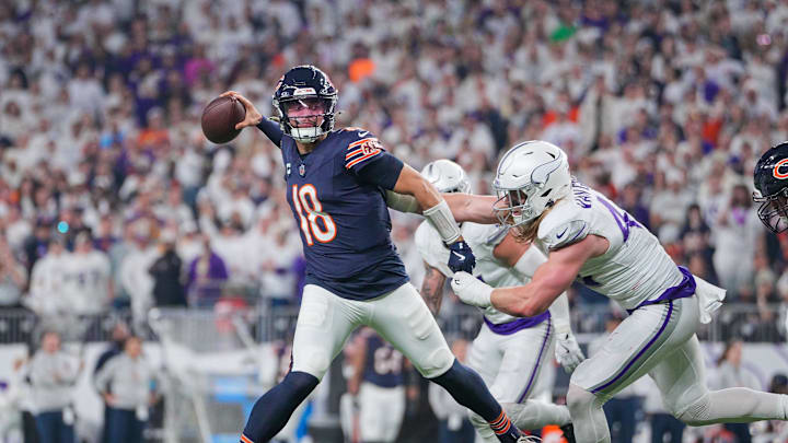 Dec 16, 2024; Minneapolis, Minnesota, USA; Chicago Bears quarterback Caleb Williams (18) passes against the Minnesota Vikings linebacker Andrew Van Ginkel (43) in the third quarter at U.S. Bank Stadium. Mandatory Credit: Brad Rempel-Imagn Images Dec 16, 2024; Minneapolis, Minnesota, USA; Chicago Bears quarterback Caleb Williams (18) passes against the Minnesota Vikings linebacker Andrew Van Ginkel (43) in the third quarter at U.S. Bank Stadium. Mandatory Credit: Brad Rempel-Imagn Images