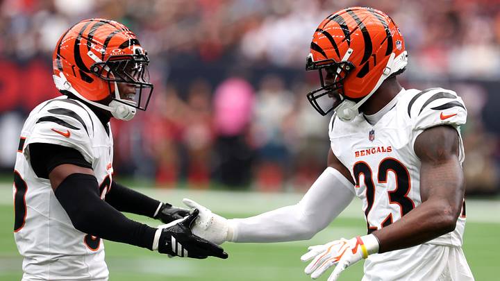 Sep 20, 2026; Houston, Texas, USA;  Cincinnati Bengals cornerback Dax Hill (23) celebrates with cornerback Jalen Davis (35) during the first quarter against the Houston Texans at Reliant Stadium.  Mandatory Credit: Thomas Shea-Imagn Images
