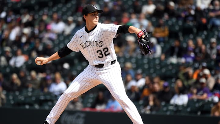 Apr 19, 2025; Denver, Colorado, USA; Colorado Rockies pitcher Chase Dollander (32) throws during the first inning against the Washington Nationals at Coors Field. Mandatory Credit: Christopher Hanewinckel-Imagn Images