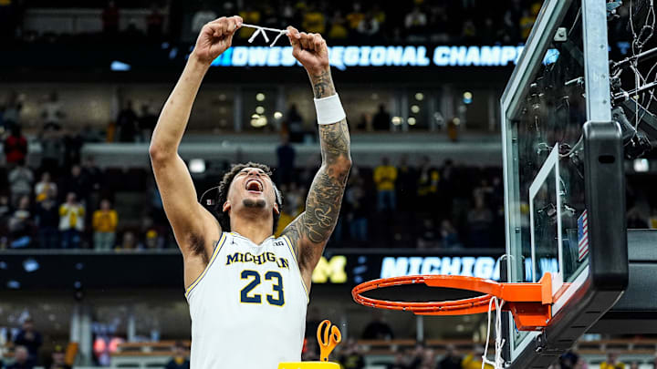 Michigan forward Yaxel Lendeborg (23) celebrates after winning the NCAA Tournament Midwest Regional Champion by defeating Tennessee 95-62 rat United Center in Chicago on Sunday, March 29, 2026.