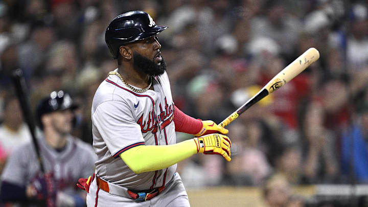 Jul 12, 2024; San Diego, California, USA; Atlanta Braves designated hitter Marcell Ozuna (20) hits a home run against the San Diego Padres during the ninth inning at Petco Park. Mandatory Credit: Orlando Ramirez-Imagn Images