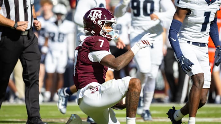 Nov 22, 2025; College Station, Texas, USA; Texas A&M Aggies wide receiver KC Concepcion (7) signals first down in the first half of game against the Samford Bulldogs at Kyle Field. Mandatory Credit: Joseph Buvid-Imagn Images