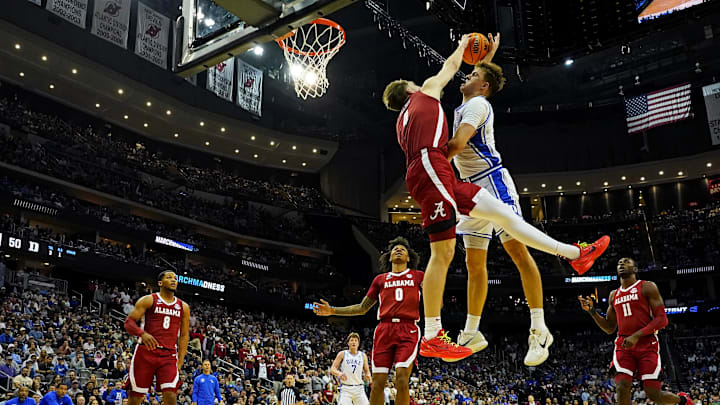 Mar 29, 2025; Newark, NJ, USA; Duke Blue Devils forward Cooper Flagg (2) goes up to dunk the ball against Alabama Crimson Tide forward Grant Nelson (4) during the second half in the East Regional final of the 2025 NCAA tournament at Prudential Center. Mandatory Credit: Robert Deutsch-Imagn Images Mar 29, 2025; Newark, NJ, USA; Duke Blue Devils forward Cooper Flagg (2) goes up to dunk the ball against Alabama Crimson Tide forward Grant Nelson (4) during the second half in the East Regional final of the 2025 NCAA tournament at Prudential Center. Mandatory Credit: Robert Deutsch-Imagn Images
