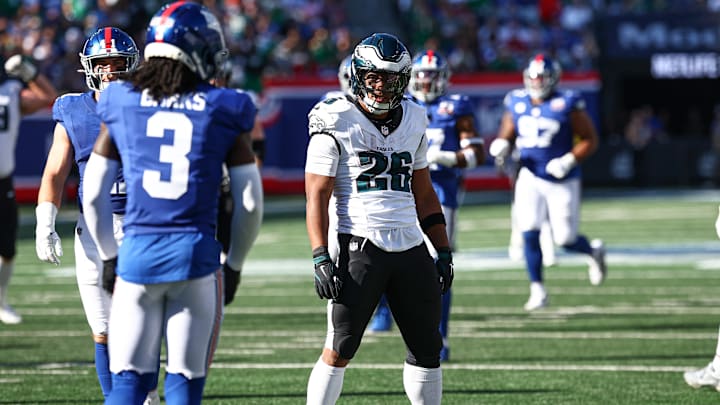 Oct 20, 2024; East Rutherford, New Jersey, USA; Philadelphia Eagles running back Saquon Barkley (26) reacts after a long run during the second half against the New York Giants at MetLife Stadium.  