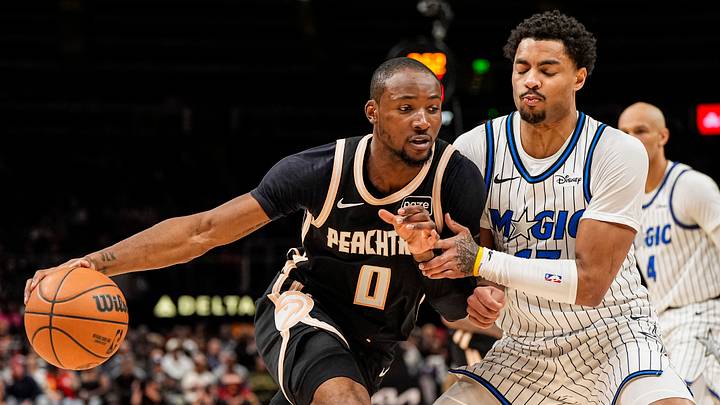 Mar 16, 2026; Atlanta, Georgia, USA; Atlanta Hawks forward Jonathan Kuminga (0) dribbles against Orlando Magic guard Jett Howard (13) during the second half at State Farm Arena. Mandatory Credit: Dale Zanine-Imagn Images Mar 16, 2026; Atlanta, Georgia, USA; Atlanta Hawks forward Jonathan Kuminga (0) dribbles against Orlando Magic guard Jett Howard (13) during the second half at State Farm Arena. Mandatory Credit: Dale Zanine-Imagn Images