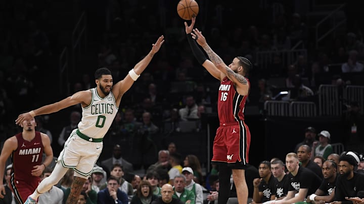 Apr 21, 2024; Boston, Massachusetts, USA; Miami Heat forward Caleb Martin (16) shoots the ball over