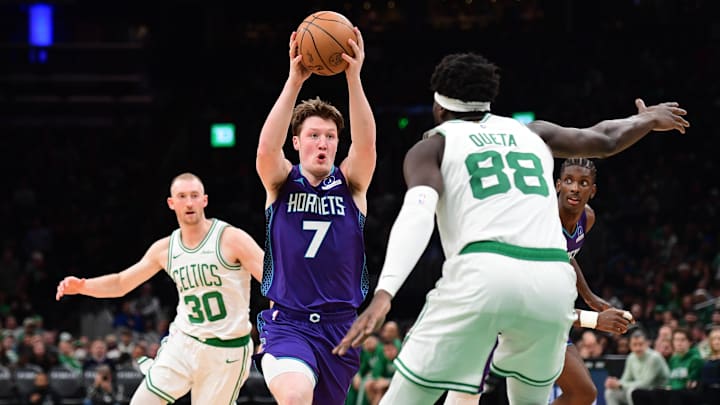 Mar 4, 2026; Boston, Massachusetts, USA; Charlotte Hornets guard Kon Knueppel (7) controls the ball while Boston Celtics center Neemias Queta (88) defends during the second half at TD Garden. Mandatory Credit: Bob DeChiara-Imagn Images Mar 4, 2026; Boston, Massachusetts, USA; Charlotte Hornets guard Kon Knueppel (7) controls the ball while Boston Celtics center Neemias Queta (88) defends during the second half at TD Garden. Mandatory Credit: Bob DeChiara-Imagn Images
